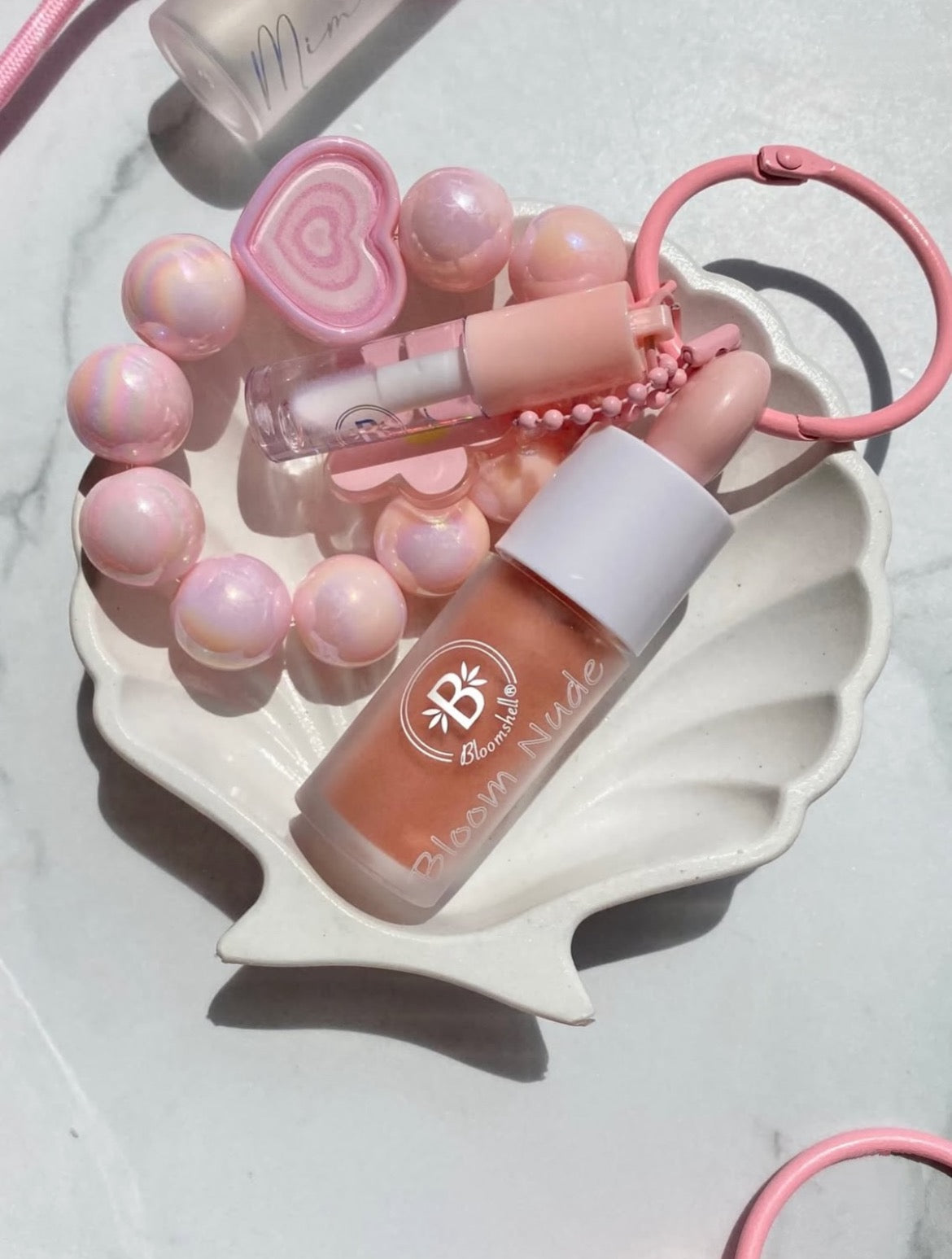 LLAVERO BLOOMSHELL NUDE